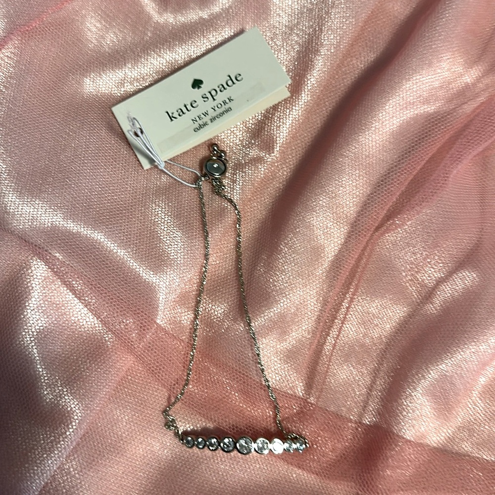 NWT silver Kate Spade bracelet. Adjustable